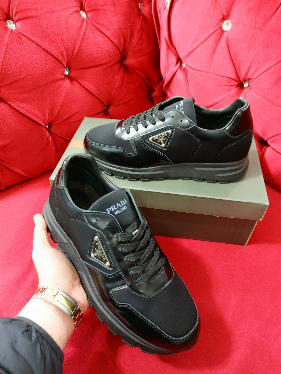 Prada sneakers logo
