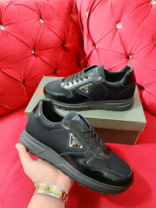 Prada sneakers logo