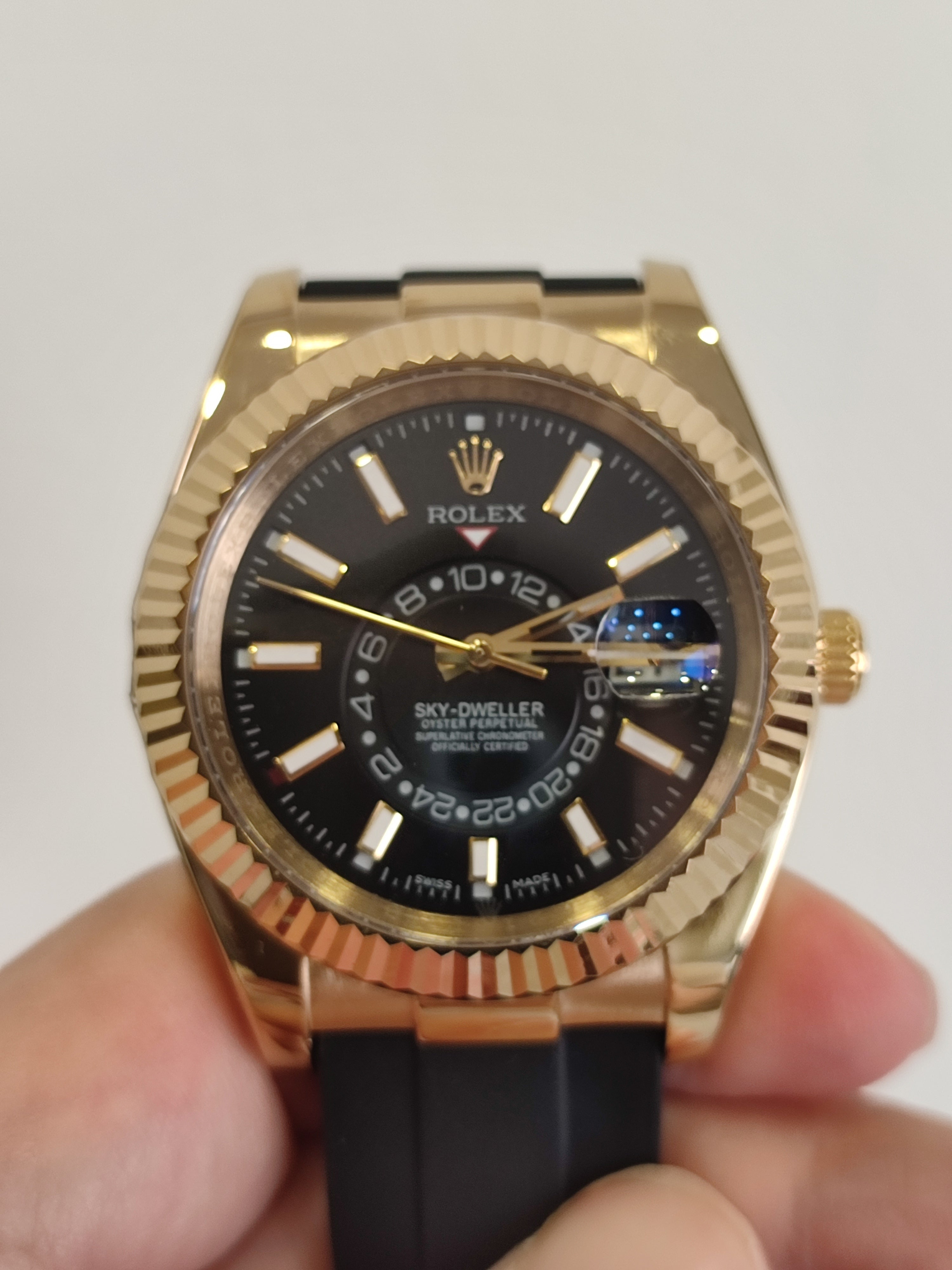 Skydweller gold bezel black dial oyster flex